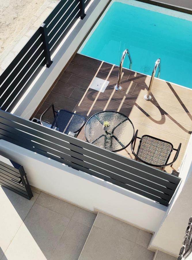 Aelia Seaside Luxury Suites Nea Karvali Exterior photo